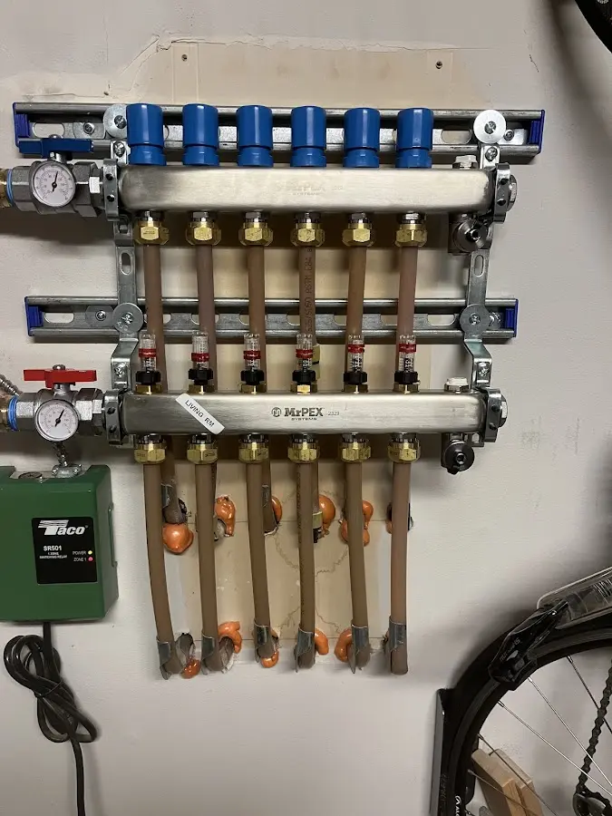 Plumber performing Gas Leak Detection at a residential property in Bedford